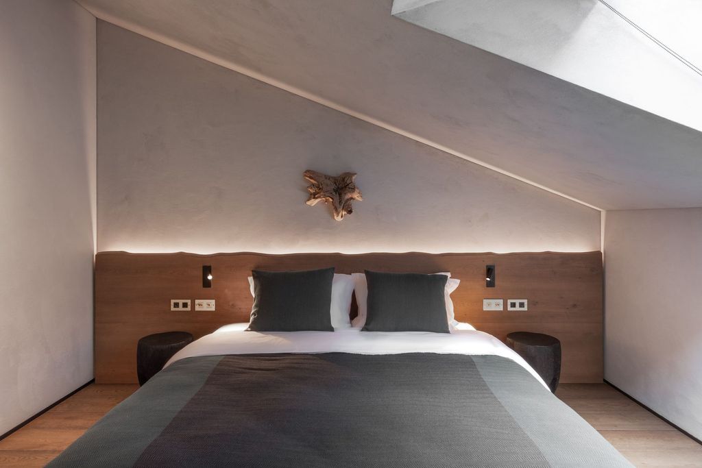 Luxury loft room interior at Esperanza Lake Resort with elegant wooden design.