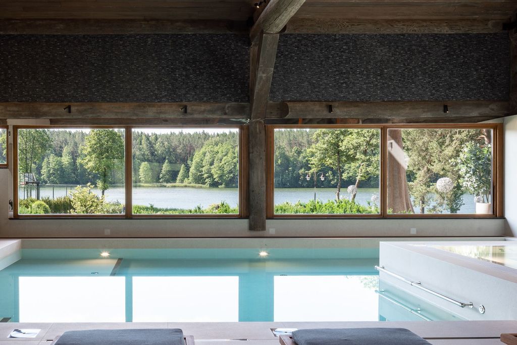 Luxury spa retreat interiors with warm tones and natural wellness design.