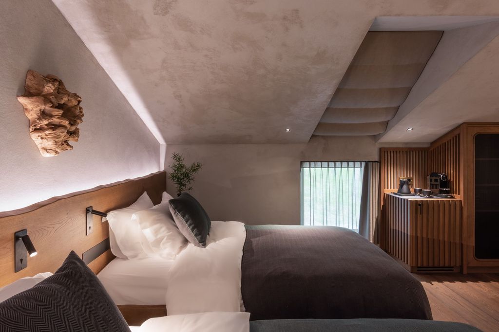 Minimalist loft room featuring a warm wood interior with a calming view.