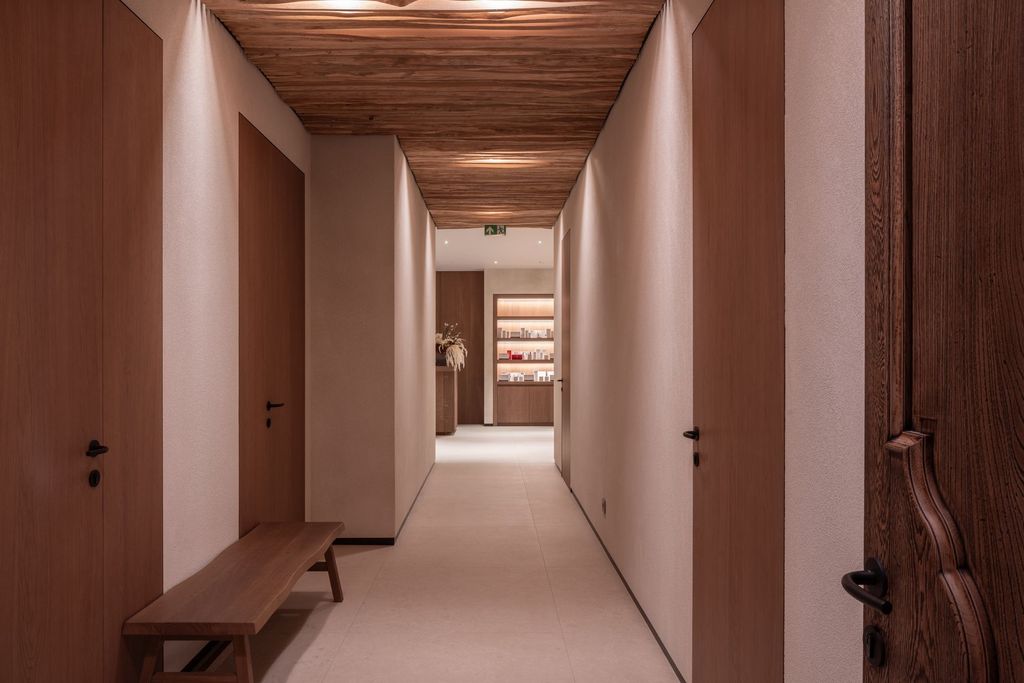 Elegant spa hallway at Esperanza Lake Resort luxury resort designed for calm transitions.